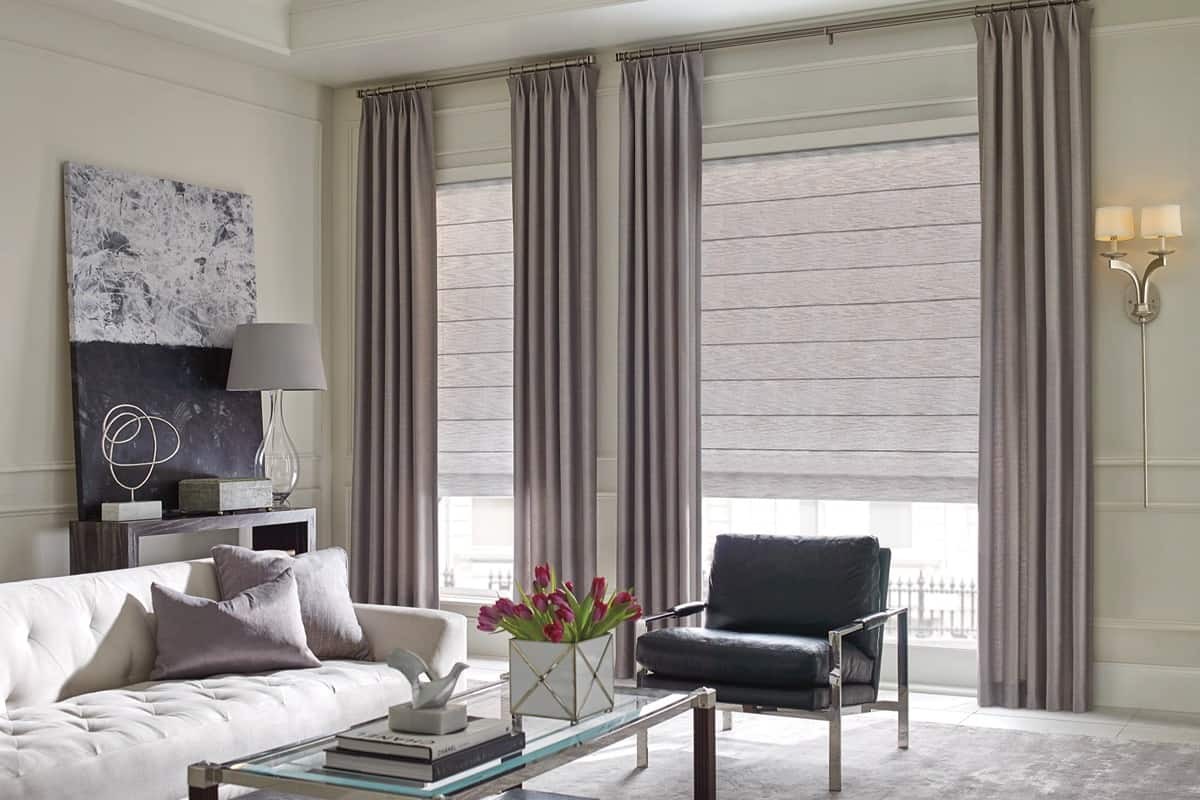 Hunter Douglas Design Studio™ Roman Shades hanging from a home’s window near Springfield, Illinois (IL)