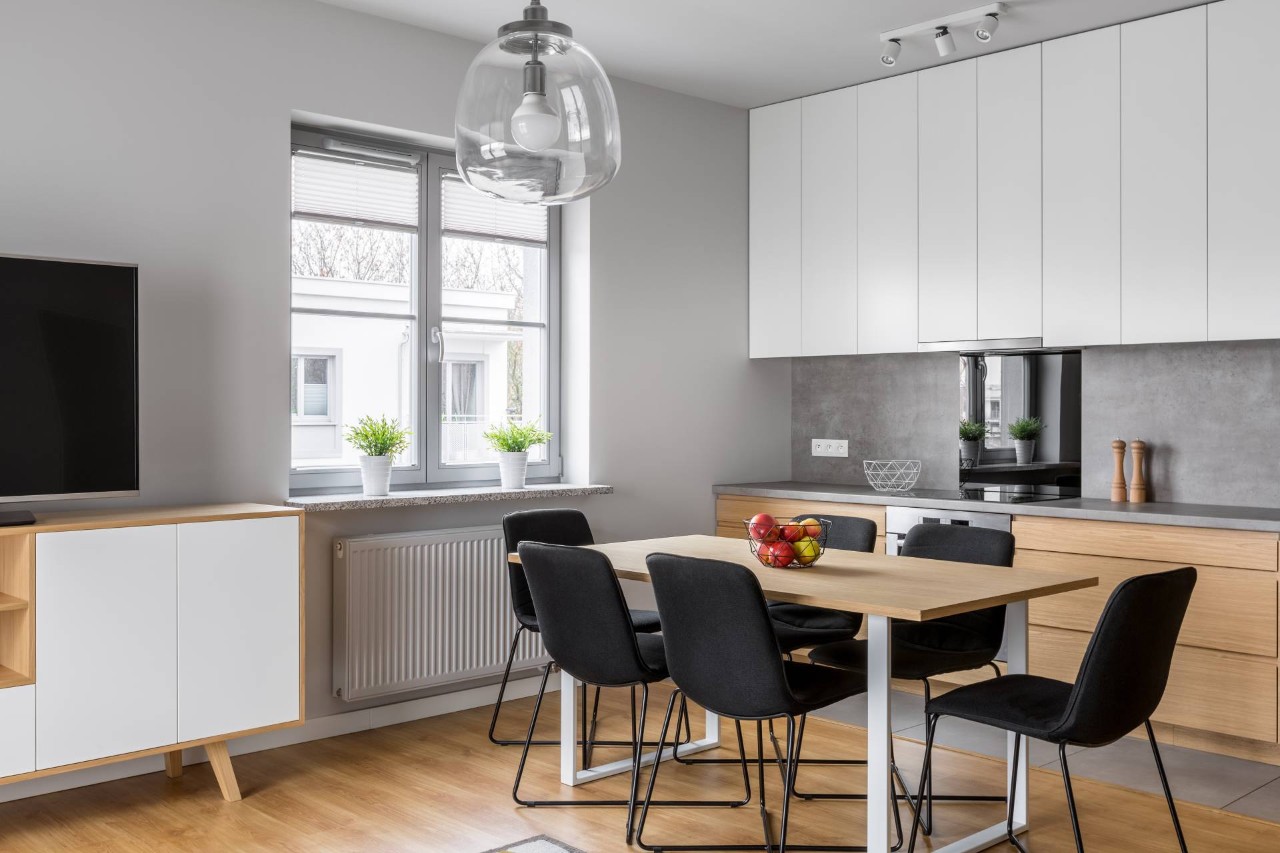 A small dining room with a window that lets in natural light at House to a Home Interiors near Springfield, Illinois (IL)